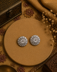 Antique finish floral pattern studs in pure silver