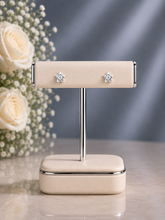 Small star studs with a 3 mm cz stone set in pure silver