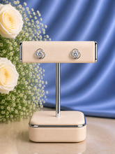 6mm single cz stone studs with a rotated border made in pure silver