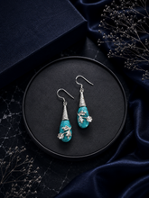 Turquoise floral creeper pattern hangings in pure silver