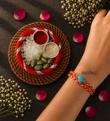 Silver Oval Turquoise motif rakhi