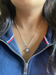 1.2cm diameter Pearl rava pendant with an 18'' chain in pure silver