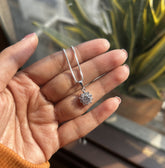 Compact flower pattern cz stone pendant with an 18'' chain in pure silver