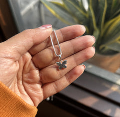 Flat butterfly pendant with an 18'' chain in pure silver