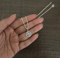 1.1 cm diameter multi cz stone pendant with an 18'' chain in pure silver
