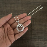 2.2 cm diameter multi cz stone studded Om motif pendant with an 18'' chain in pure silver