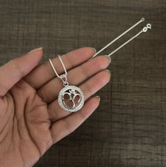 2.2 cm diameter multi cz stone studded Om motif pendant with an 18'' chain in pure silver