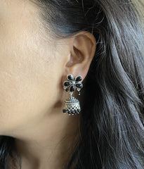 Black onyx flower stud pattern jhumkas in pure silver