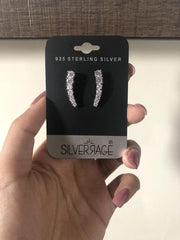 Seven cz stone studs in pure silver