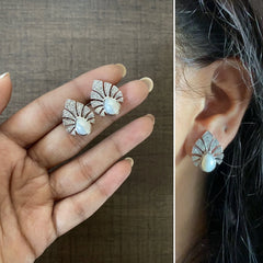 Multiple cz stone peacock feather motif earstuds with a pearl center in pure silver