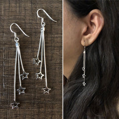 Star shaped 7.5 cm long hangings crafted in pure silver
