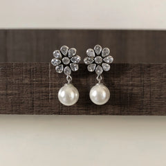 Flower cz stone studs with pearl drops in pure silver