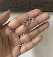 Footsteps pattern stud with five tiny cz stones in pure silver