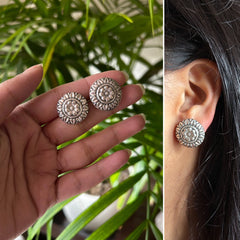 Antique finish floral pattern studs in pure silver