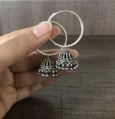 Antique finish jhumkas in 3 cm thick plain balis in pure silver