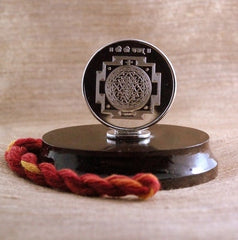 Auspicious Shree Yantra Pure Silver Idol on a rosewood base
