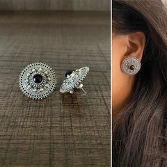 Big size 2.5 cm diameter rava and carving work studs with a black onyx center in pure silver