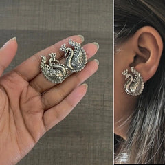 Big size antique finish peacock studs in pure silver