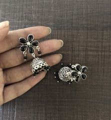 Black onyx flower stud pattern jhumkas in pure silver