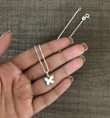 Flat butterfly pendant with an 18'' chain in pure silver