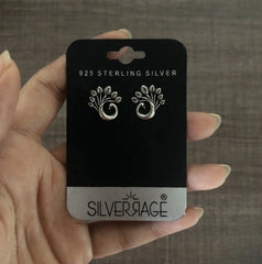 Curved peacock studs in pure silver with an antique finish