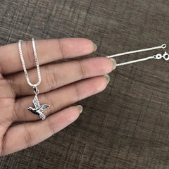 Dove pendant with an 18'' chain in pure silver