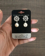 Flower cz stone studs with pearl drops in pure silver