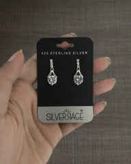 Four cz stone inverted V pattern studs in pure silver