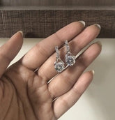 Four cz stone inverted V pattern studs in pure silver