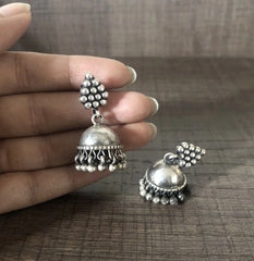 Grape cluster pattern stud with antique hammered texture jhumkas in pure silver