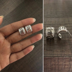 Half circle cz stone studded cut work studs in pure silver