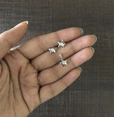 Small star shaped earring and pendant set with a 3mm cz stone in pure silver