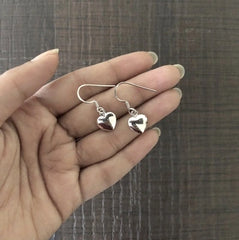 Hollow heart shape earrings in pure silver