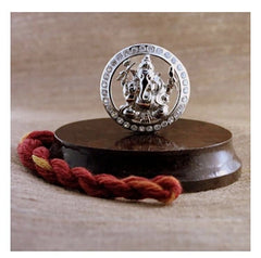 Divine Ganesha Pure Silver Idol with a cz stone border on a rosewood base