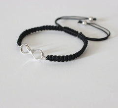 Infinity motif adjustable hand braided bracelet made in pure silver
