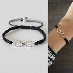 Infinity motif adjustable hand braided bracelet made in pure silver