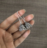 Antique finish lockable loop jhumkas in pure silver