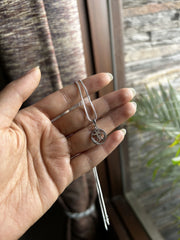 1.2cm diameter Om in circle pendant with an 18inch chain in pure silver