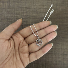 1.2cm diameter Om in circle pendant with an 18inch chain in pure silver