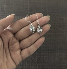 Oval cz stone with border hangings in pure silver