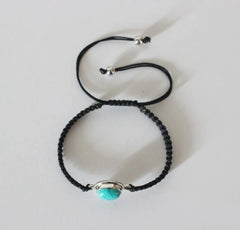 Oval Turquoise stone adjustable hand braided bracelet made in pure silver