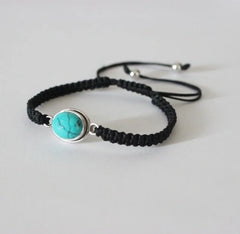 Oval Turquoise stone adjustable hand braided bracelet made in pure silver