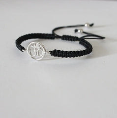 Pure silver adjustable Om motif hand braided bracelet