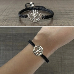 Pure silver adjustable Om-Trishul motif hand braided bracelet