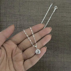 8mm transparent cz stone six prong pendant with an 18'' Figaro chain in pure silver