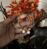 5cm textured balis with frosted balls and fresh water pearl drops with 22 kt gold plating set in pure silver