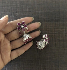 Ruby pink cut stone flower stud pattern jhumkas in pure silver