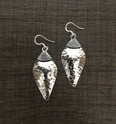 Shell shape beaten texture handmade earrings in pure silver