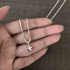 Single cz stone star pendant with an 18'' chain in pure silver