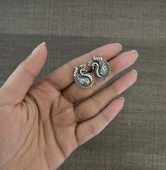 Small size antique finish peacock studs in pure silver